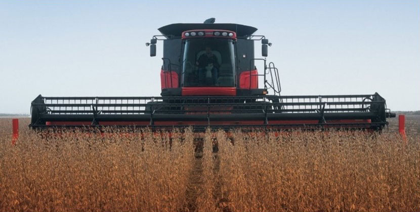 Photo - soybean harvester working in field