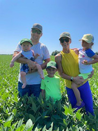 Photo - family group - soybean field in background